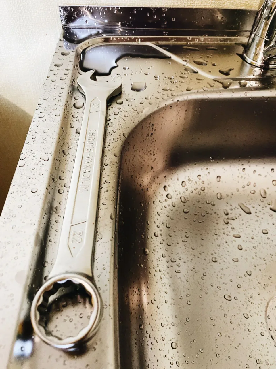 Wrench — Water Damage — Wrench, Stainless Steel Sink, Faucet, Water Damage, Water Damage